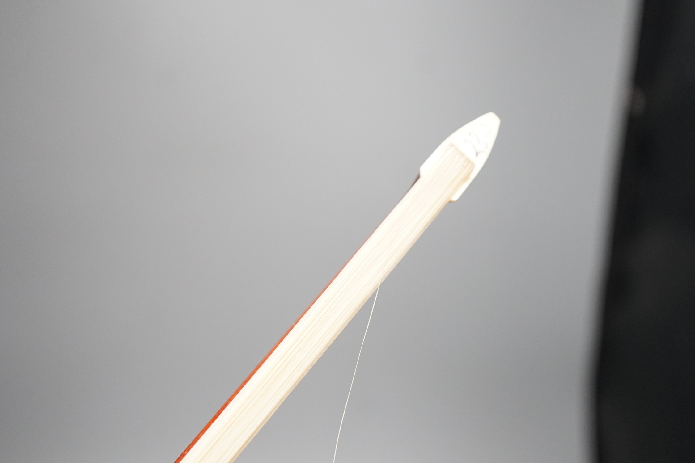 An R. Paesold, Germany violin bow with ivory veneered tip, 74cm